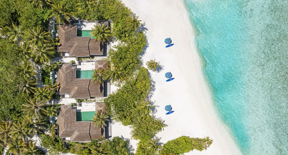 Aerial view of Beach House with Pool at Naladhu Private Island Maldives