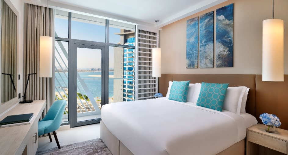 Bedroom of the superior bedroom sea view apartment at NH Collection Dubai The Palm