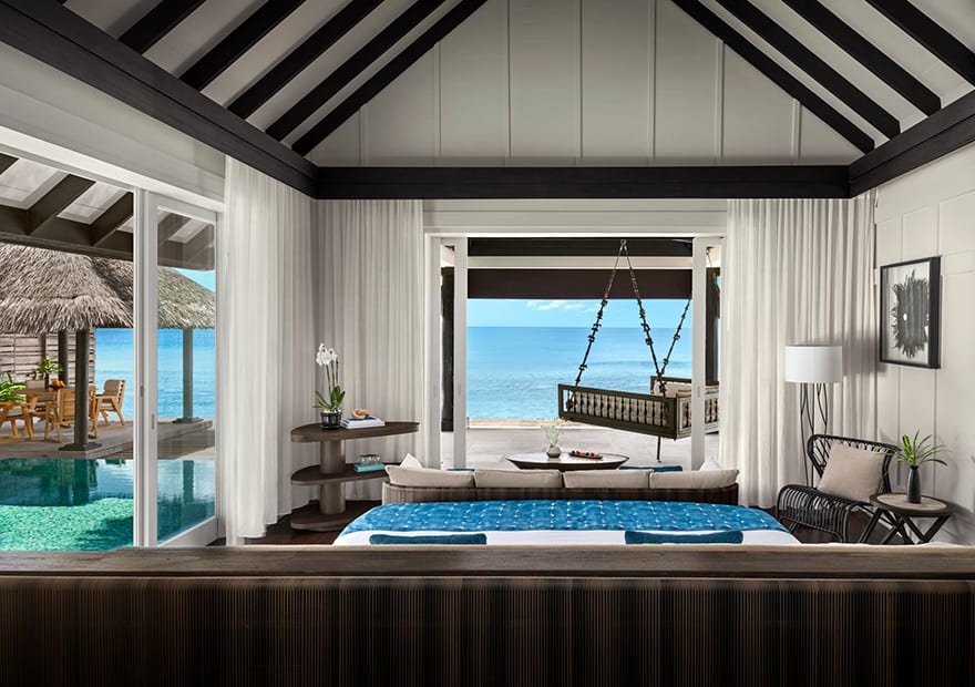 Luxury ocean house bedroom with panoramic sea view at Naladhu Private Island Maldives.