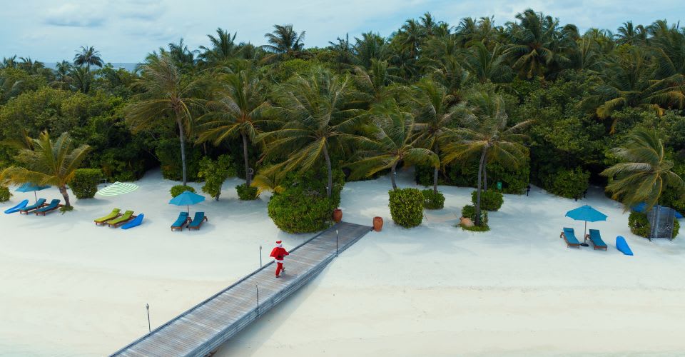 Celebrating Christmas in the Maldives with the Santa's arrival at Naladhu Private Island Maldives