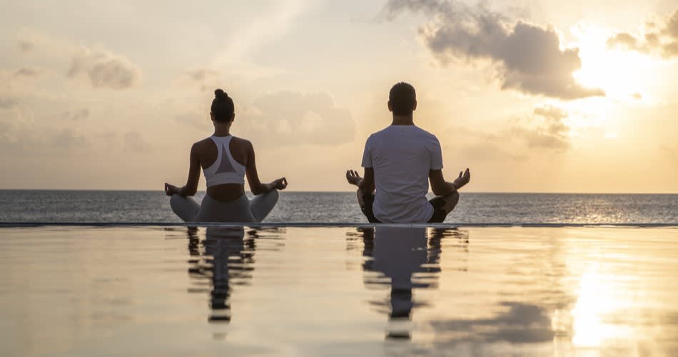 Sunset Yoga at Naladhu Private Island Maldives