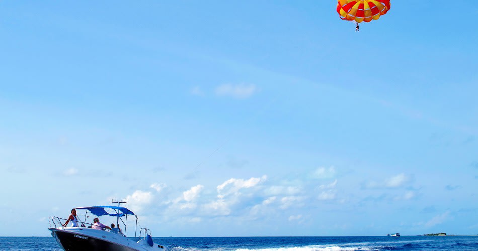 Parasailing at Anantara Dhigu Maldives Resort - Maldives Family Activities
