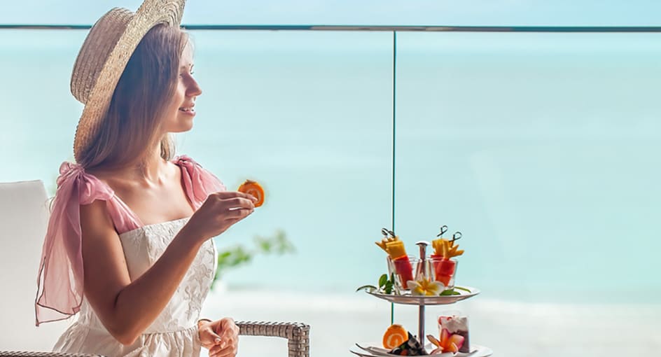 Girl enjoying high tea on the roof top