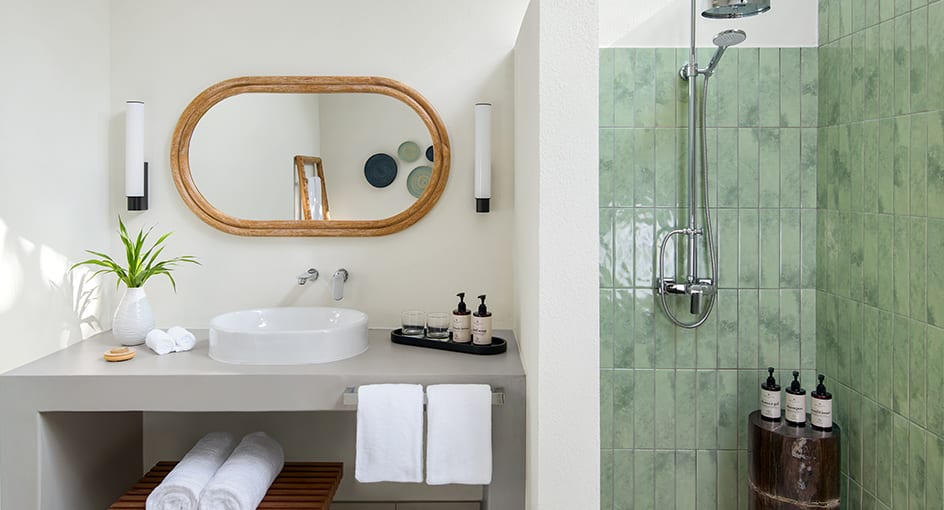 Stylish guest bathroom at NH Collection Maldives Reethi Beach with minimalist island design