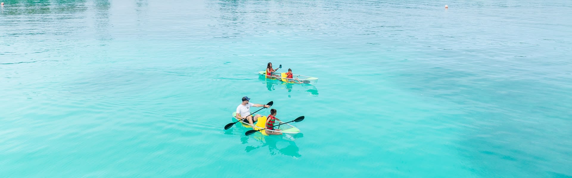 Family kayaking at Niyama Private Islands Maldives