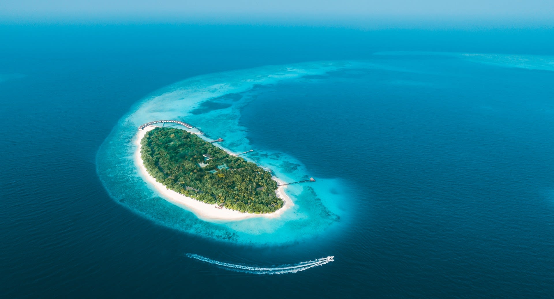 Island aerial view of NH Collection Maldives Reethi Resort