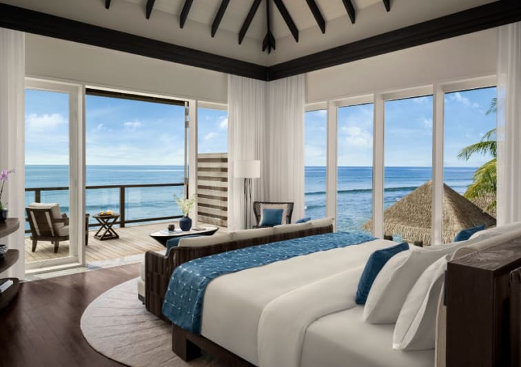 Bedroom view of the lagoon of the  Two Bedroom Beach Pool Residence at Naladhu Private Island Maldives