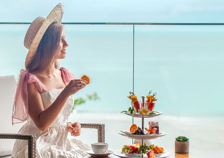 Girl enjoying high tea on the roof top