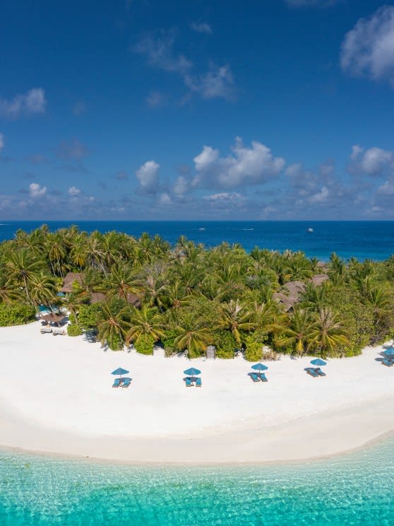 island aerial view of Naladhu Private Island Maldives