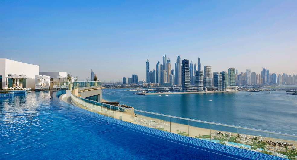 View of the city from the infinity pool at NH Collection Dubai The Palm