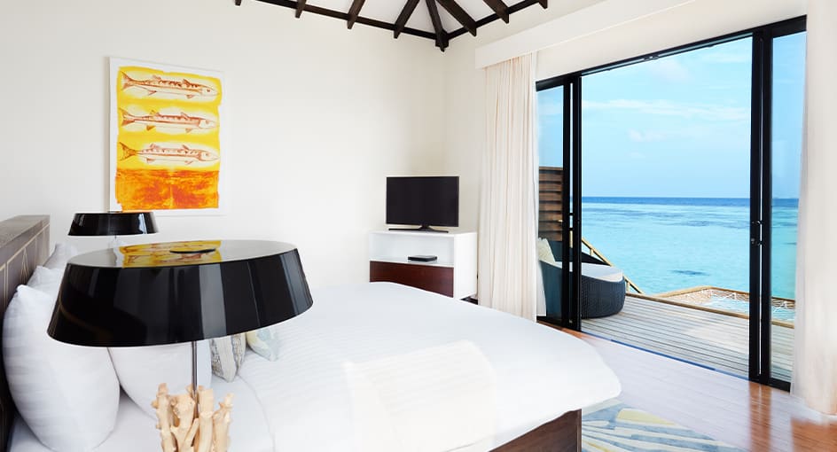 Sunset Over Water Villa in the Maldives | NH Collectiion Maldives Havodda Resort
