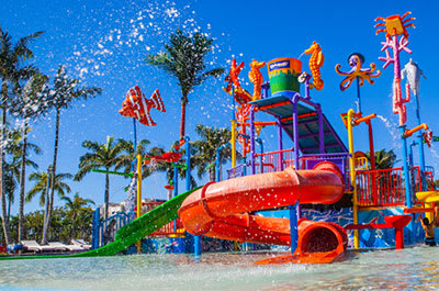 waterpark on the sunshine coast with children playing on water slide having fun day out